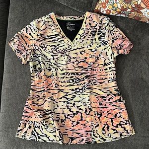 Premiere scrub top with colorful cheetah/zebra print
